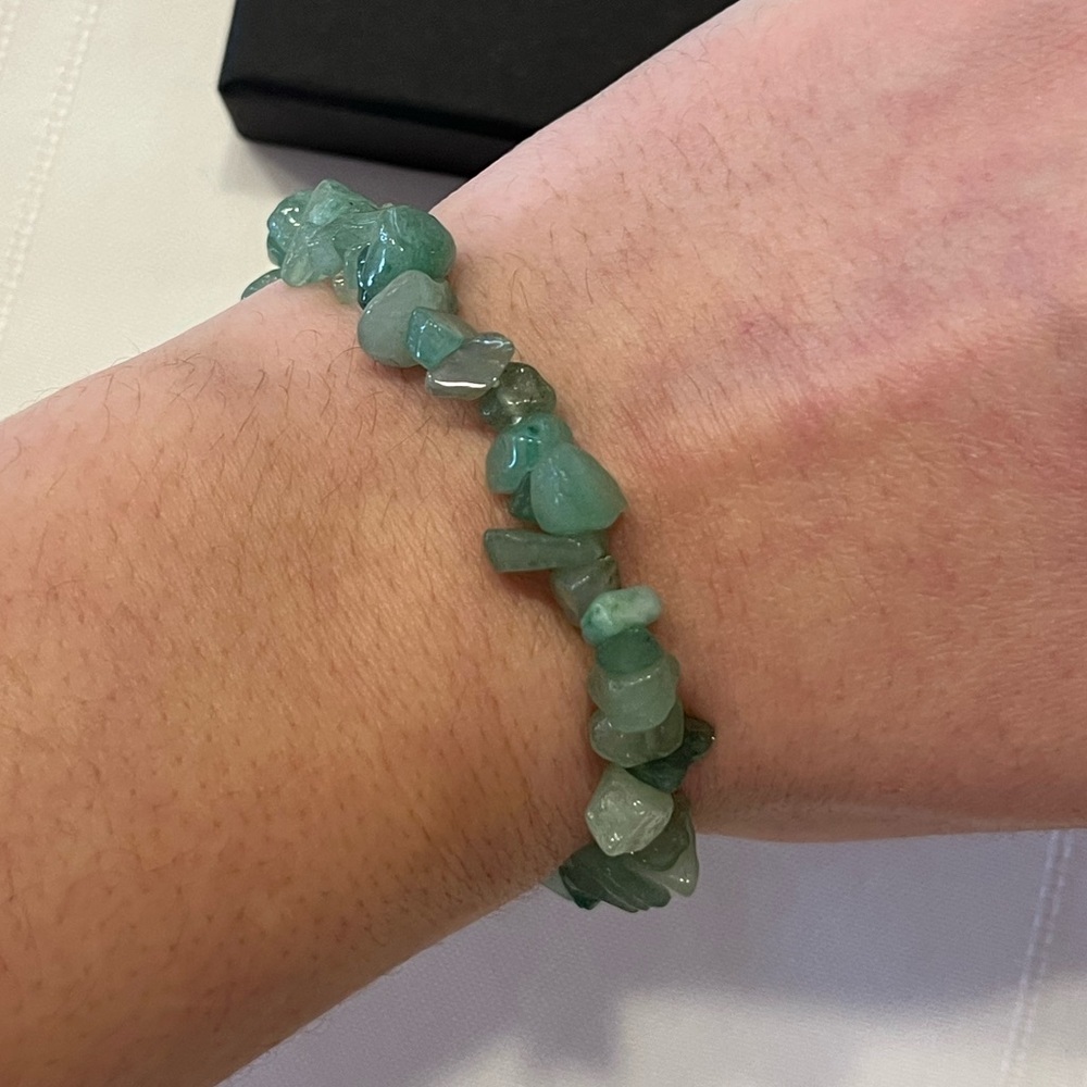 Natural green aventurine chip stone bracelet on an elastic stretch cord